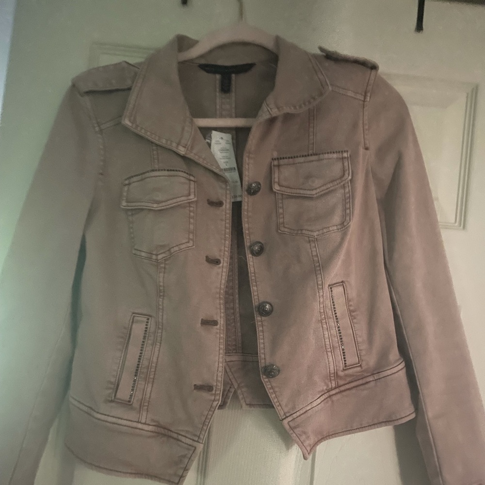 Jean jacket in washed mauve color by White house Black market. Size 4